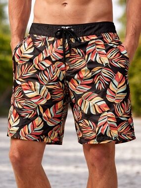 Reef Black Tropical Leaf Board Shorts with Red & Cream Accents